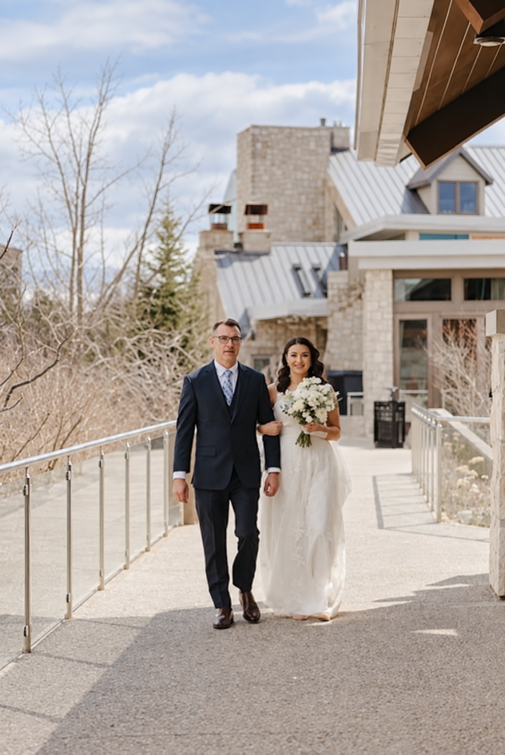 Father of the bride accompanying his daughter